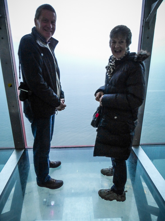 At the top of the Tower on the glass floor.