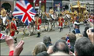 The Queen's Gold State Coach heads to St. Paul's